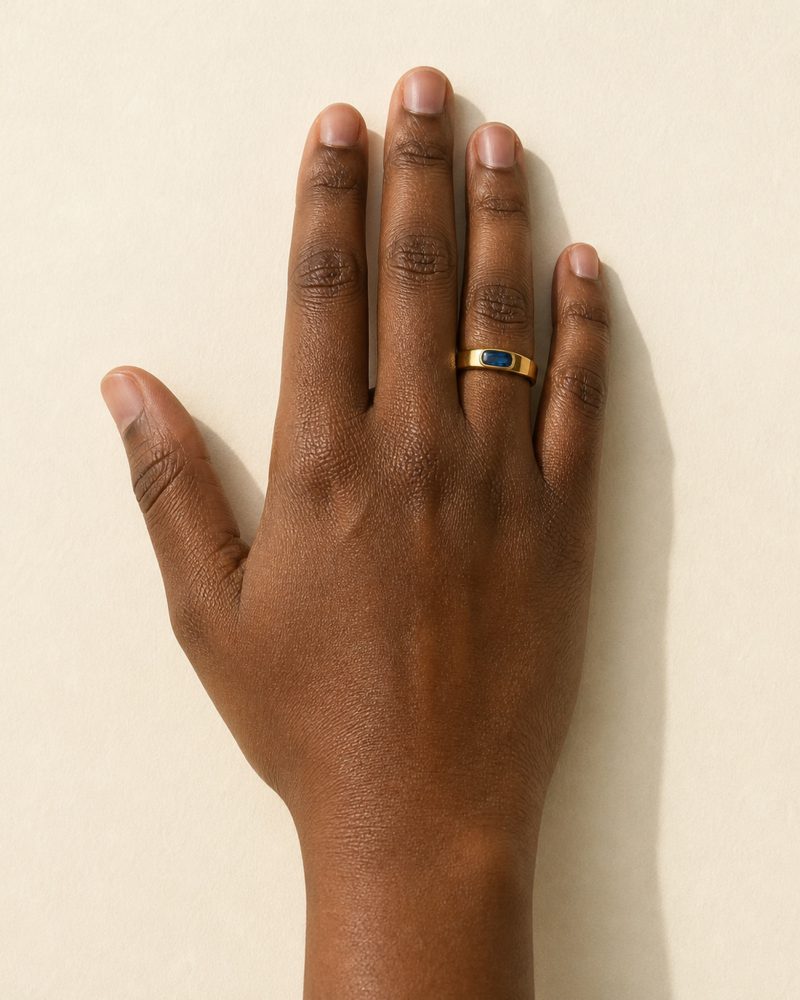 A ring worn on an unretouched hand